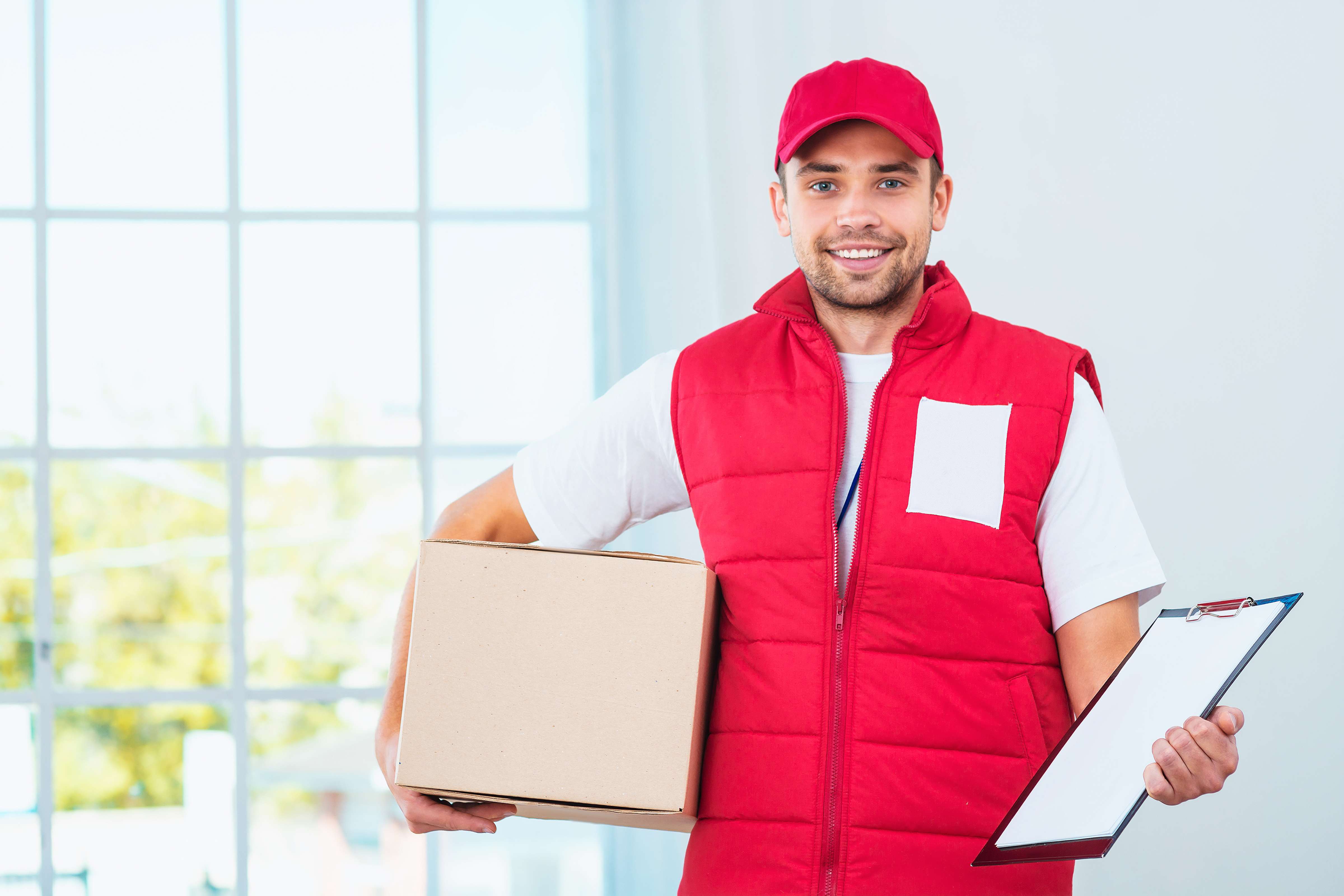 delivery man with clip board